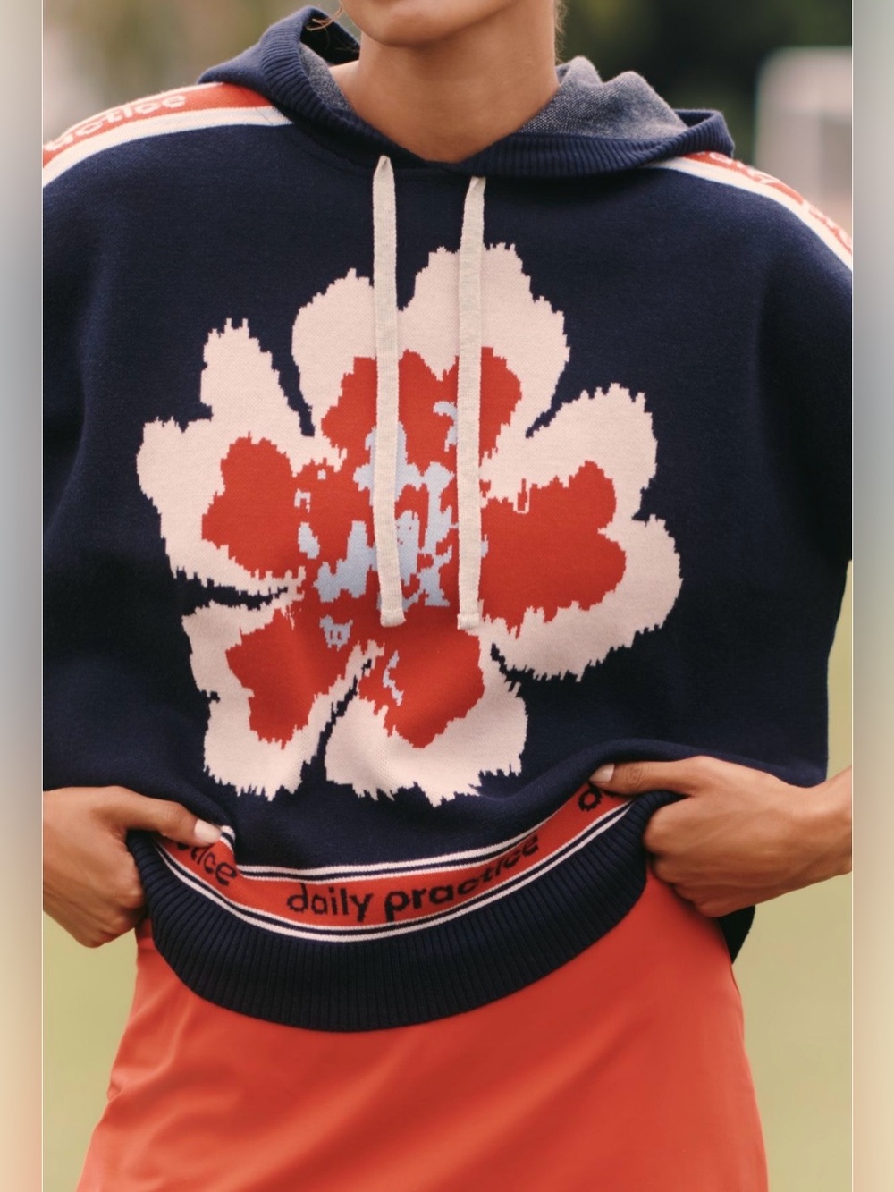 Daily practice hooded graphic varsity top